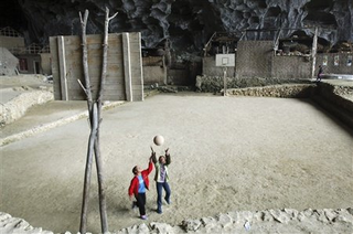 Illustration for article titled Fantastical places around the world where you can live in a cave